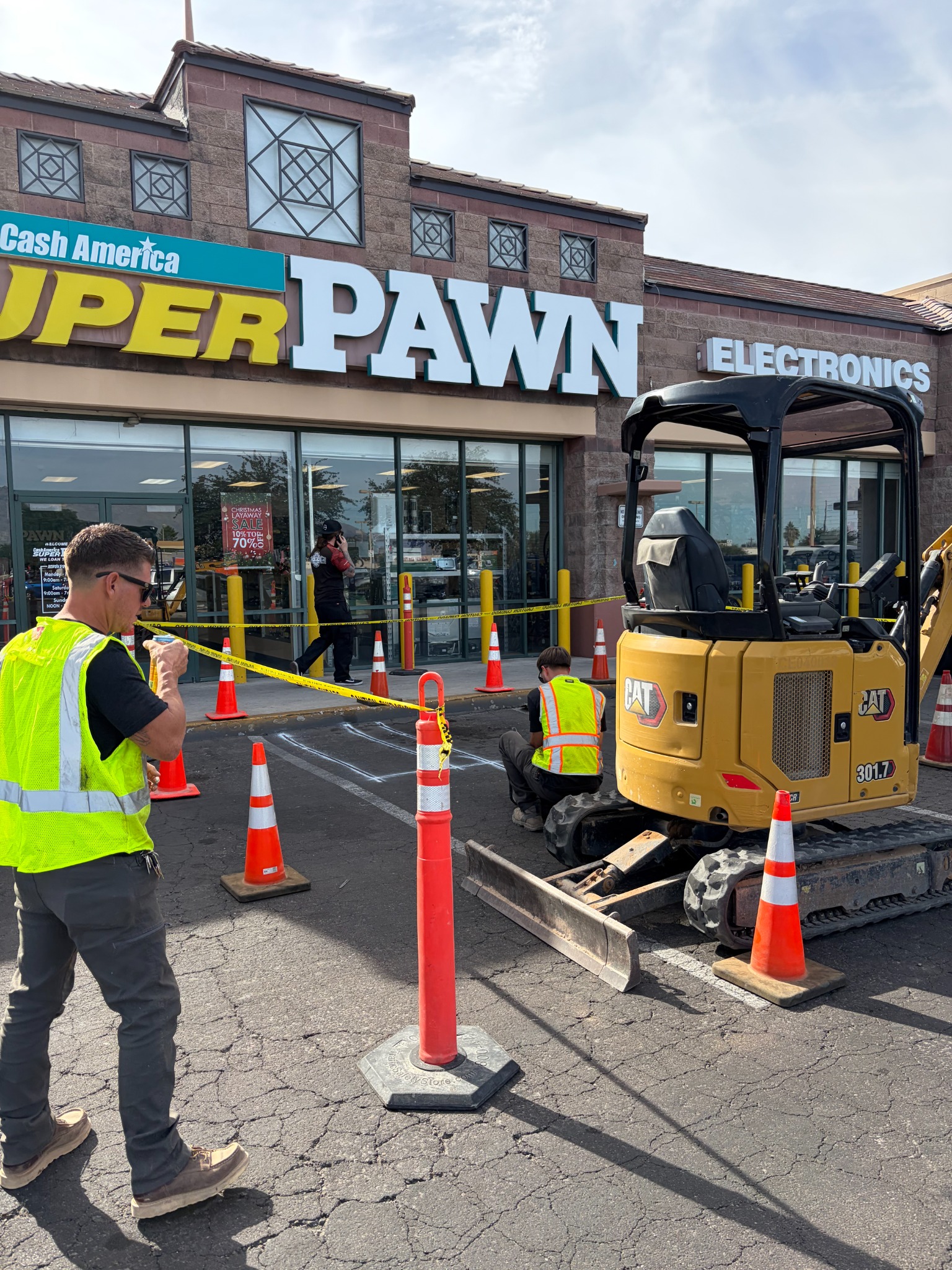 LINERWORX crew performing commercial pipeline work at an operating Tucson retail property